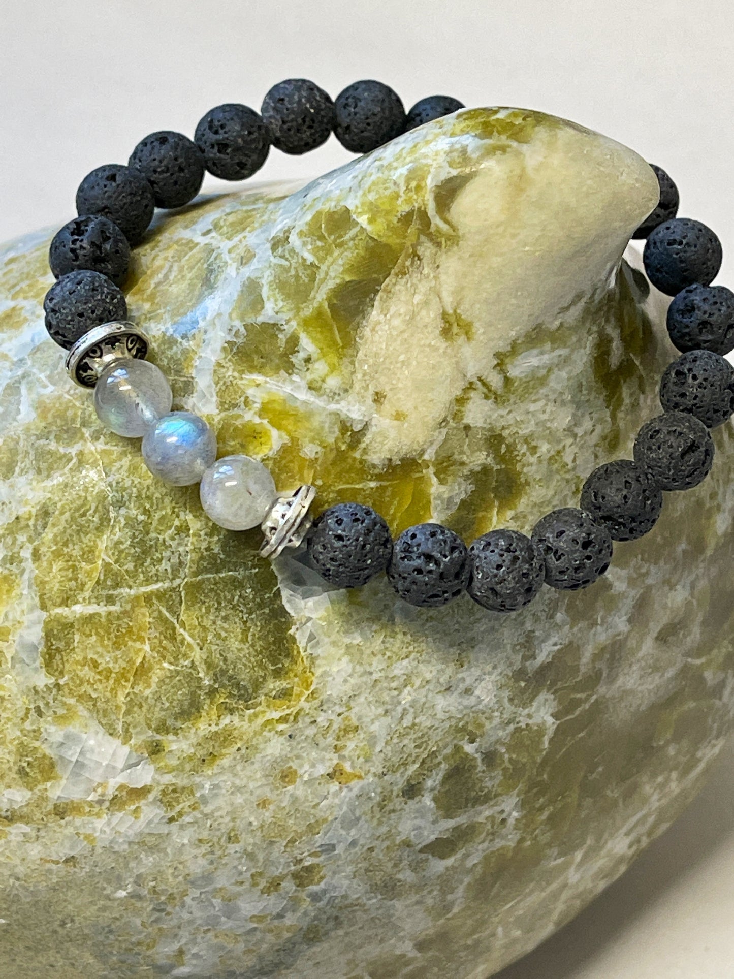 Rainbow Moonstone Lava Stone Bracelet can be used for calming, awakening the inner goddess, aromatherapy